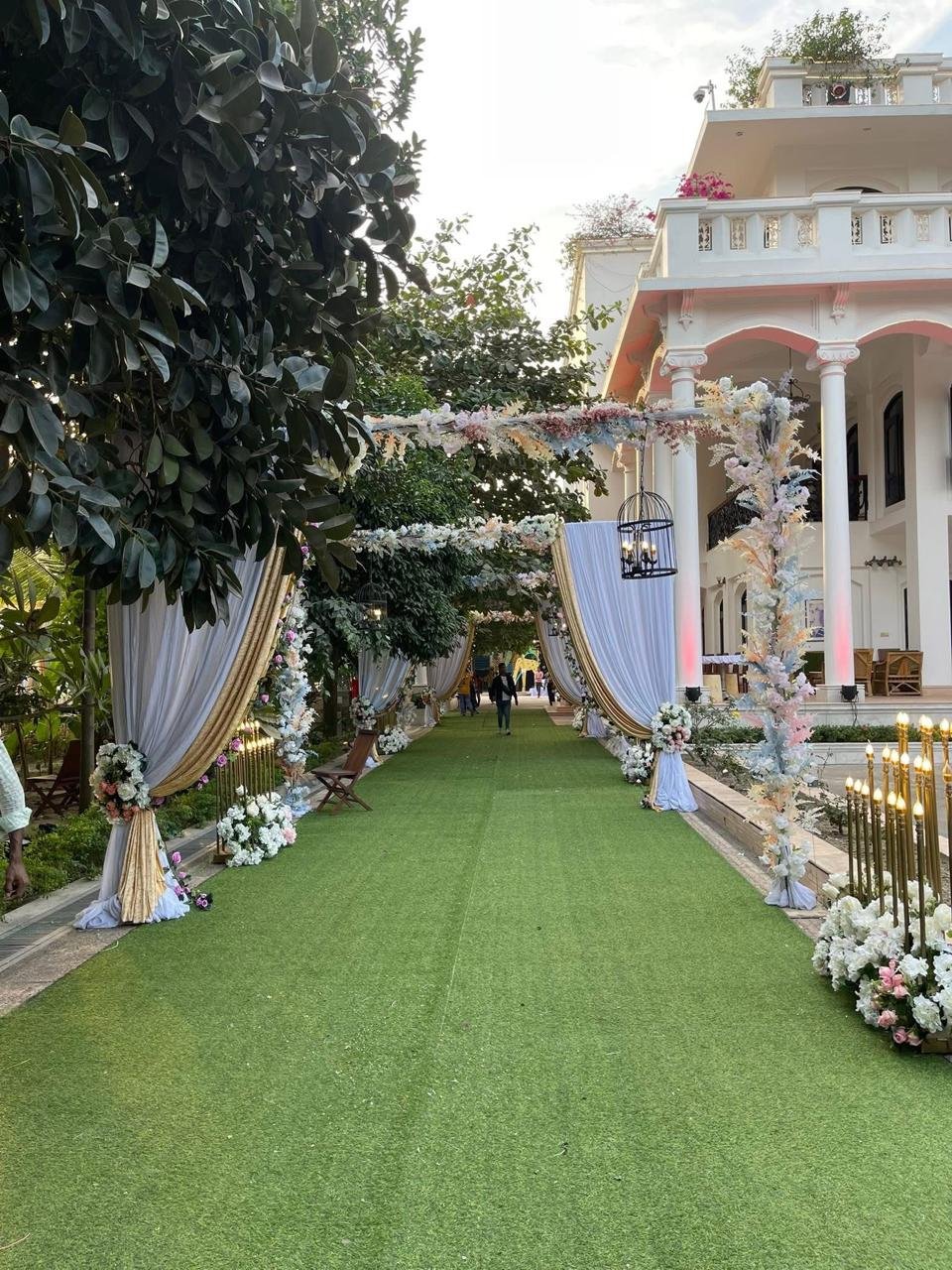 A floral walkway set across the lawn